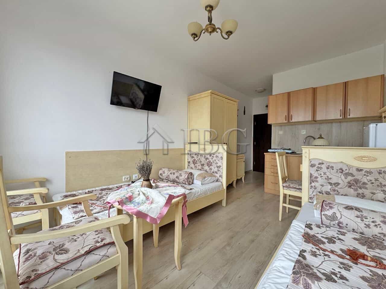 Furnished studio apartment with modern decor, located in Sunny Beach, perfect for short-term stays.