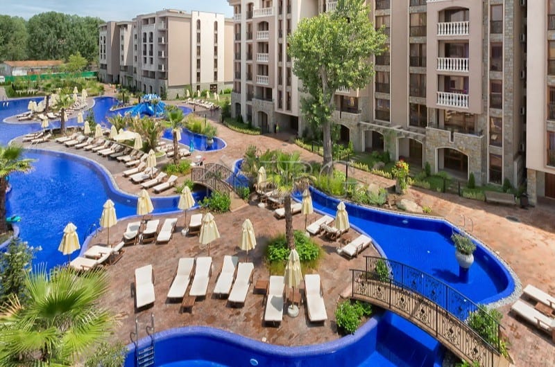 Luxurious 1-bedroom apartment at Cascadas Family Resort, Sunny Beach, with pools and garden views.