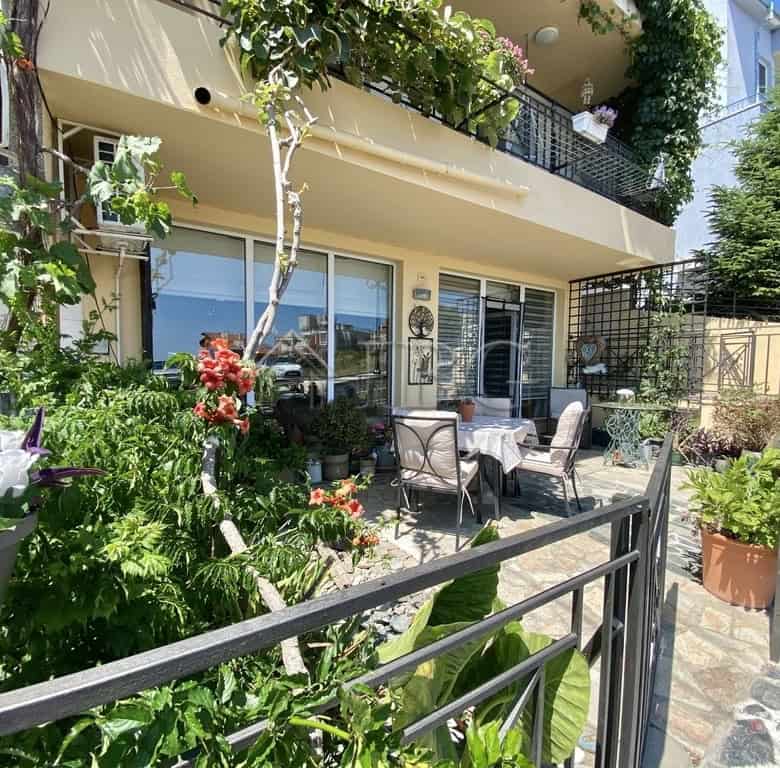 Bright outdoor terrace with garden and seating area in Sveti Vlas.