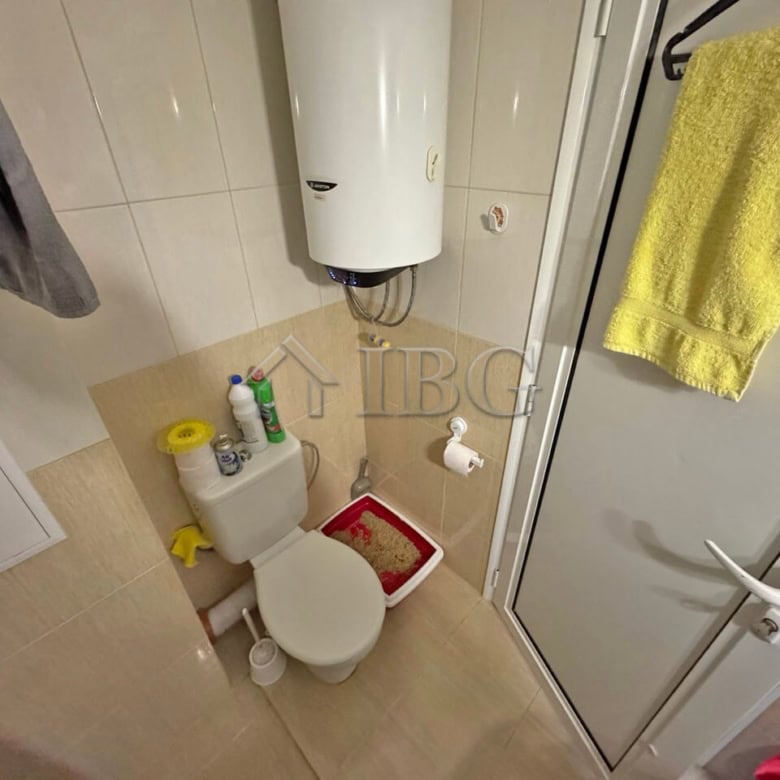 Compact bathroom in a furnished studio with balcony at Topoli Complex, Sunny Beach.