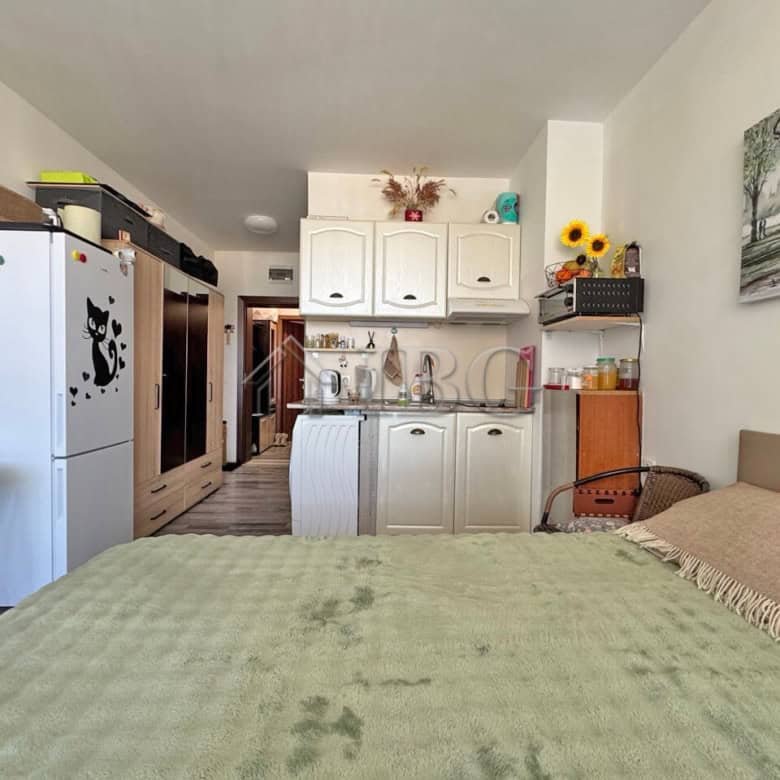 Furnished studio with balcony in Topoli Complex, Sunny Beach, featuring a cozy interior and scenic v.