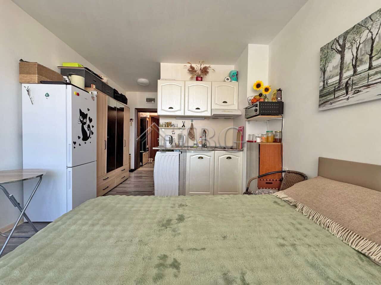 Furnished studio with balcony in Topoli Complex, Sunny Beach, featuring a cozy interior and scenic v.