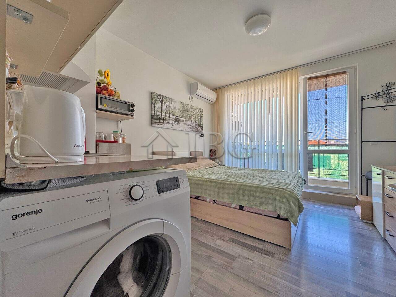 Furnished studio apartment with balcony, modern amenities, and scenic views in Topoli Complex, Sunny.