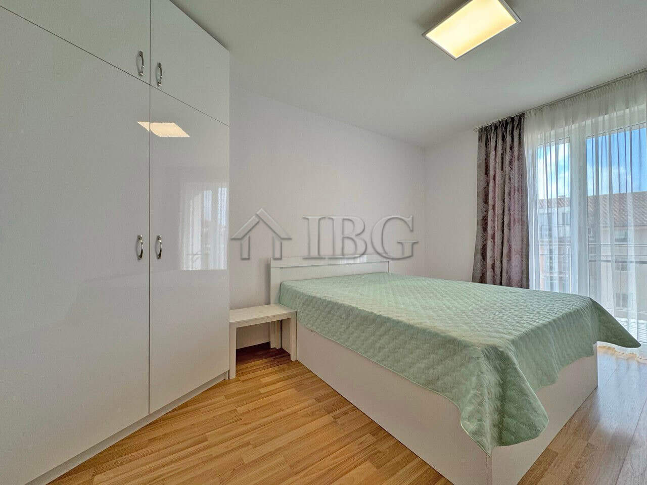 Apartment with pool view and modern furnishings in Sunny Beach.