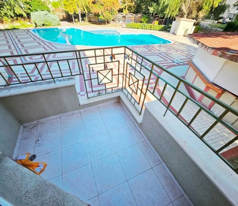 Balcony of a 1-bedroom apartment with pool view, 55 sq.m., located in Prestige City, just 300 meters.