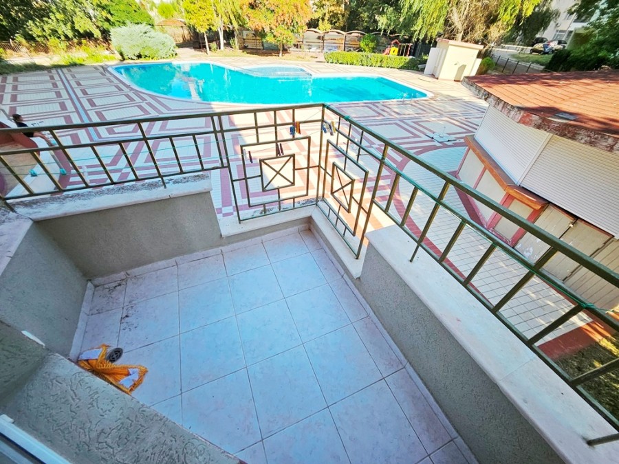 Balcony of a 1-bedroom apartment with pool view, 55 sq.m., located in Prestige City, just 300 meters.