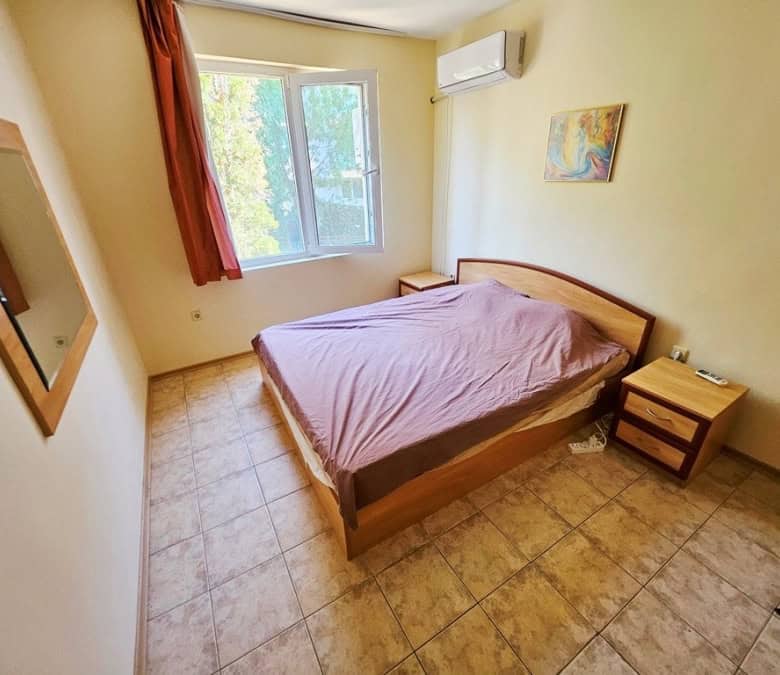 Comfortable bedroom with pool view in Prestige City, near the sea.