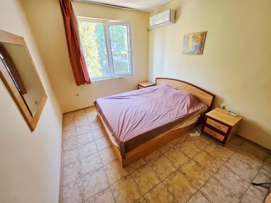 Comfortable bedroom with pool view in Prestige City, near the sea.